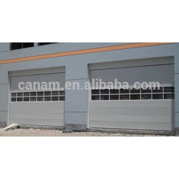 Automatic industrial overhead door with sectional panel