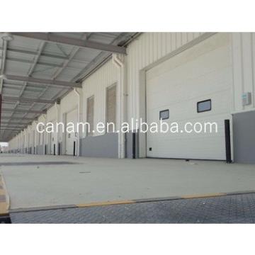 Sectional Industrial Door -- Overhead; High Lifting, Vertical Uplifting Available