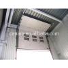 CE automatic color steel PU sandwich panel insulated industrial door,high lifting garage door