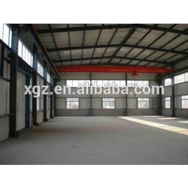steel factory warehouse building with overhead crane #1 image
