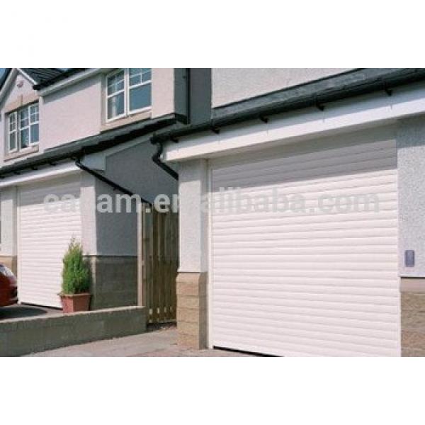 Accommodate automobiles and other vehicles insulated industrial electric garage door #1 image