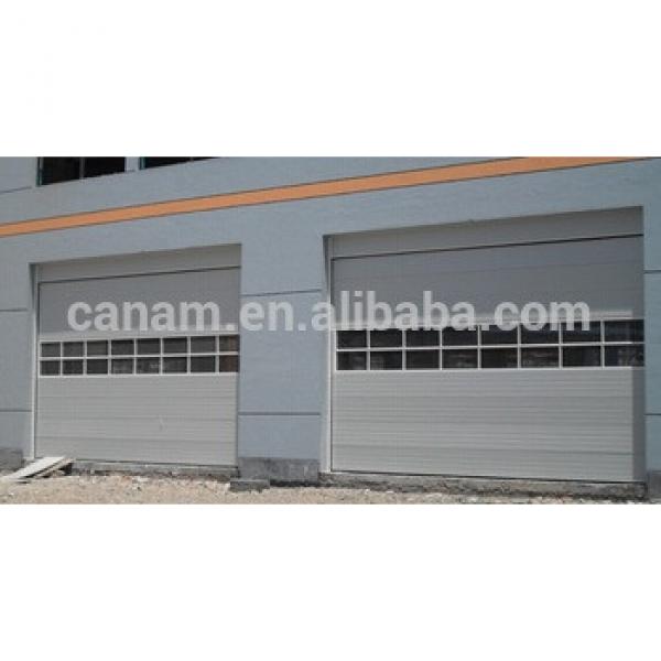 Automatic industrial overhead door with sectional panel #1 image