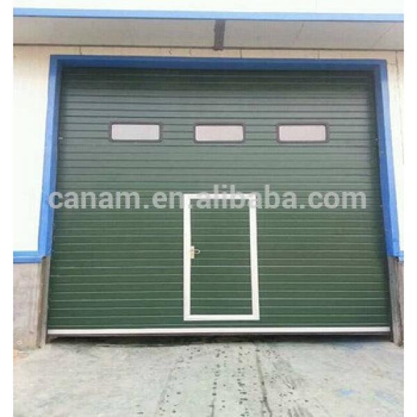 Industrial insulated automatic sectional overhead door #1 image