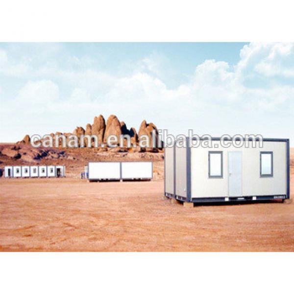 Small moving modified shipping containers homes with pillars and two windows #1 image