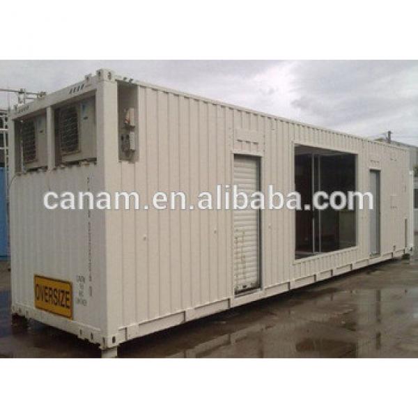 Steel structure anti storm 40ft shipping container house with pull down doors #1 image